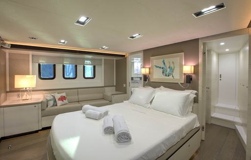 large bed in the light and airy master suite on board luxury yacht ARCHSEA 