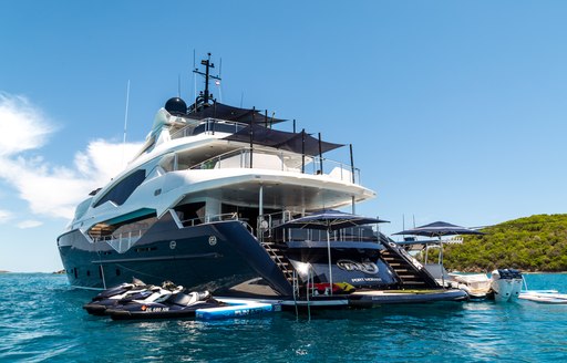 motor yacht Take 5 anchored on a Mediterranean yacht charter with toys