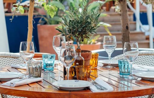 Dining table set for a meal at Ruhl plage