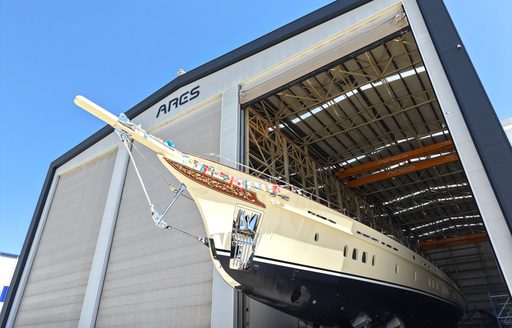 Yacht rental SIMENA emerging from construction shed