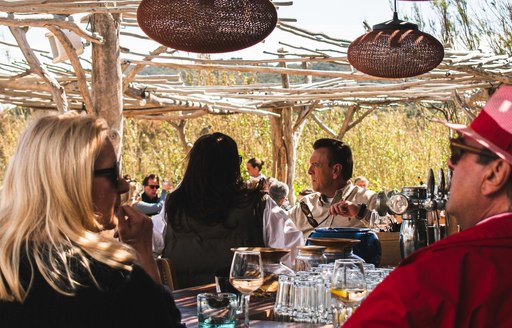 St Tropez - La Cabane Bambou dining area people
