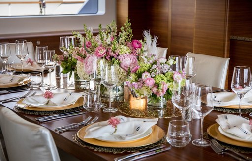 Tablescaping entry at the Newport Charter Yacht Show, pink floral arrangement center