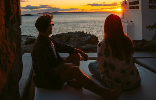 Cavo Tagoo Mykonos people, sunset