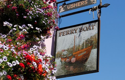 A sign over a pub in Dartmouth, Devon