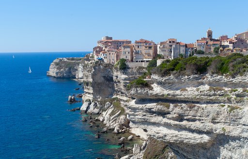 Medieval town overlooking sea in Corsica, France