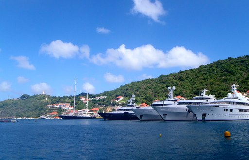 Five superyachts sat at-anchor in St Martin