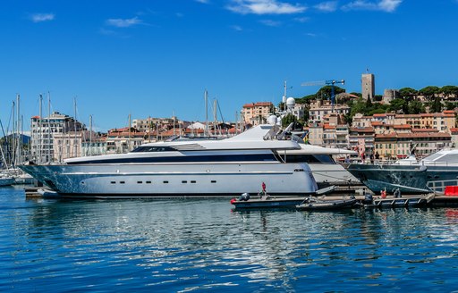 Ground-level view of Vieux Port with motor yacht charters berthed