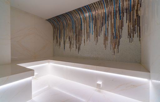 Light colored tiled room on superyacht O'PARI