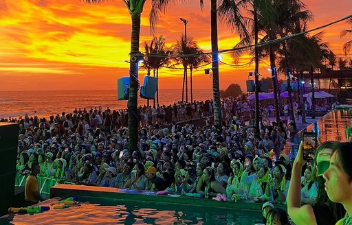 Atlas Beach Club Bali crowd sunset
