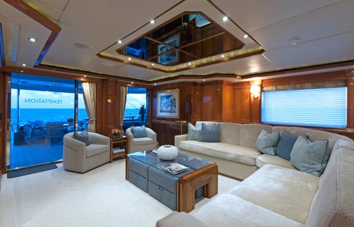 The main salon of motor yacht TEMPTATION