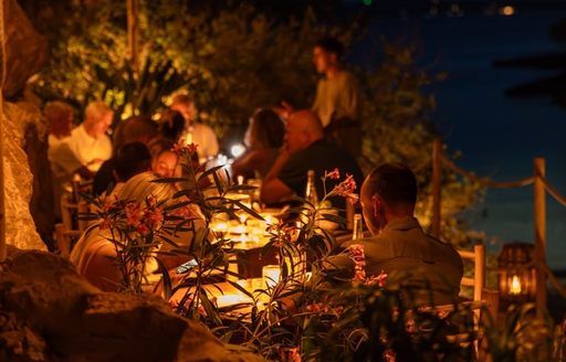 Cala Gracioneta Ibiza outdoor dining area, night