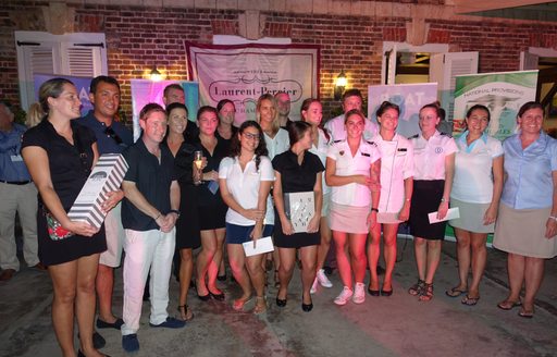 Crew members receive an award at the Antigua Charter Yacht Show