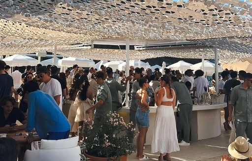 Crowd of visitors at Lucca Beach