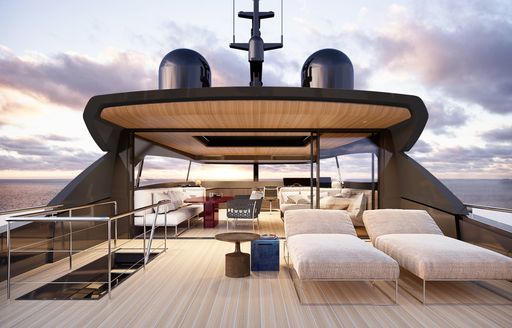 Overview of the sun deck onboard charter yacht Almost There, with sunloungers in the foreground