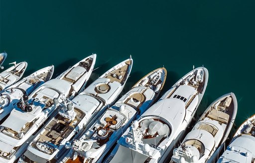 Superyacht charters berthed in line