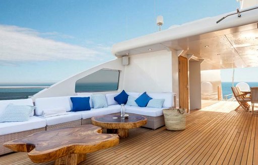 Comfortable seating and teak deck on O'MEGA superyacht 