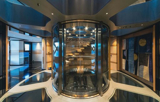 Glass elevator onboard charter yacht PROJECT X