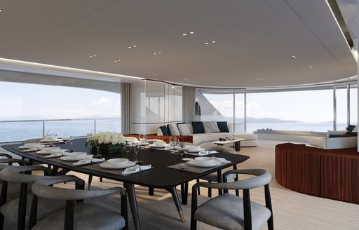 Overview of the dining area in the main salon onboard charter yacht TOSUN