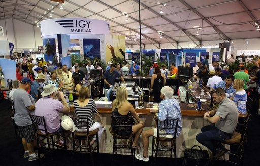 show-goers gather in the bar for a refreshing drink at FLIBS