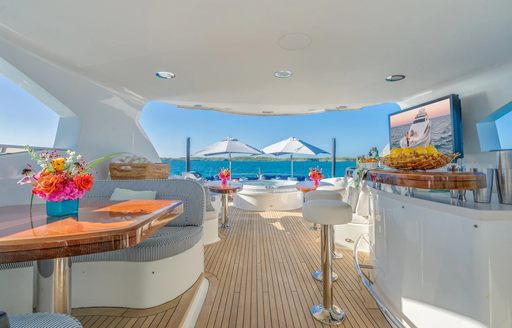 Charter yacht NAMASTAY sun deck with wet bar and stools