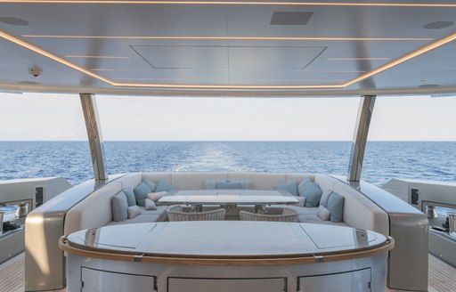 Covered dining area on superyacht EIV