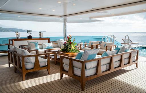 Exterior seating area onboard charter yacht AXIOMA