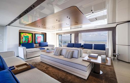 Interior lounge with sofas onboard charter yacht ACQUA CHIARA