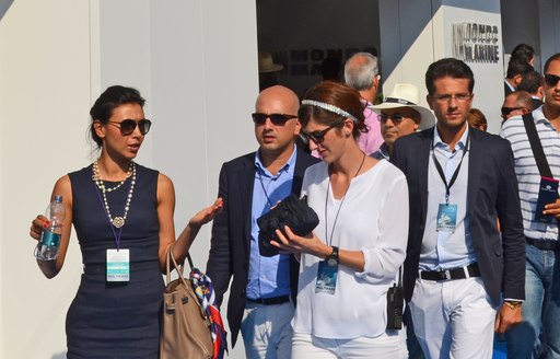 People walking the dock at Monaco Yacht Show