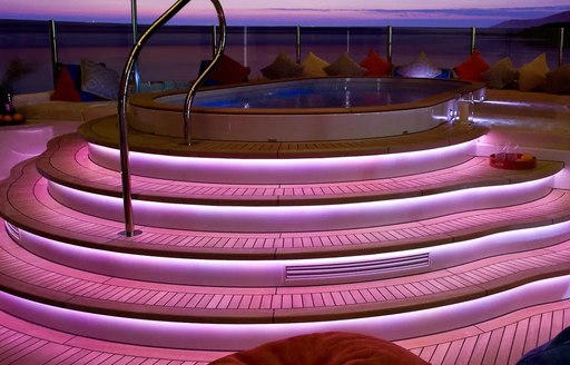 Steps up to Jacuzzi on superyacht Sea Rhapsody