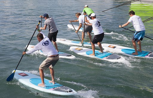 competitors in the paddle board competition at the Superyacht Cup Palma in Mallorca