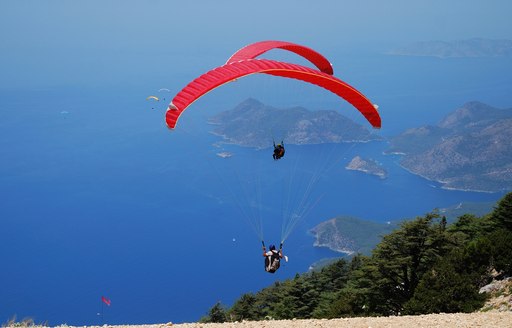 paraglider takes off over Oludeniz in Turkey