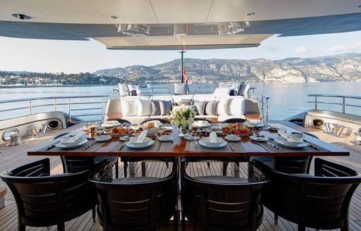 Alfresco dining on the aft main deck onboard charter yacht LADY VICTORIA