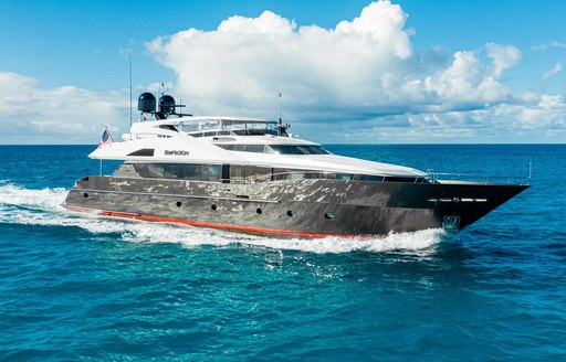Charter yacht TEMPTATION surrounded by sea