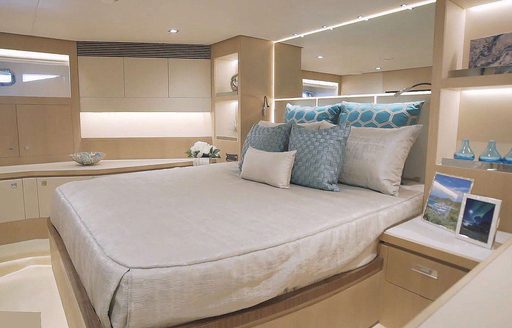 Double bed in cabin on motor yacht Aqua Life