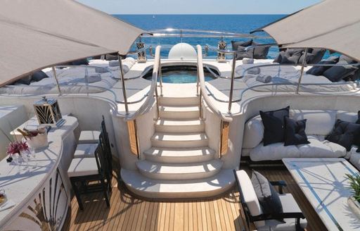 Superyacht Silver Angel sundeck with pool and sunpads