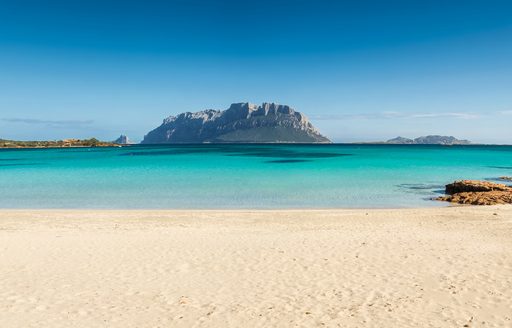 Italian island of Sardinia, white sandy beach and bright azure oceans