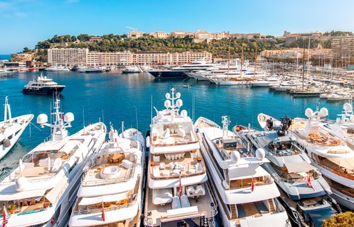 Port Hercule with many luxury charter yachts berthed