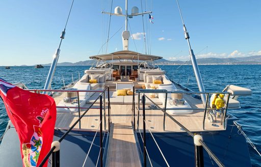 Overview of the top deck onboard charter yacht GUILLEMOT, surrounded by sea