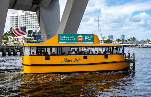 Water taxi escorting visitors at FLIBS