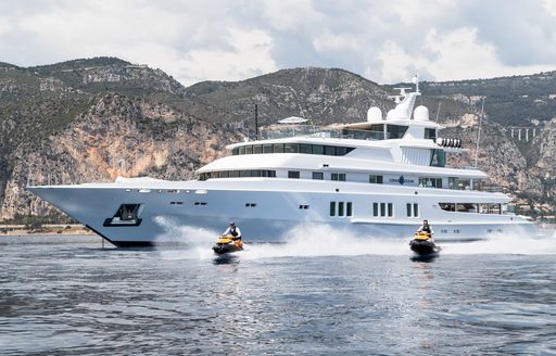 Charter yacht CORAL OCEAN at sea with cliffs in background