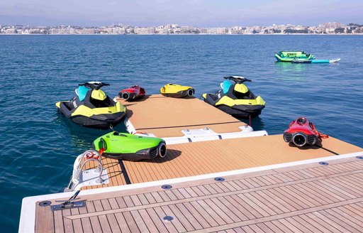 Fold out beach and swim platform with water toys set up onboard boat charter CHARADE