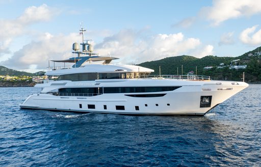 Charter yacht WATERCOLOURS at anchor in a bay