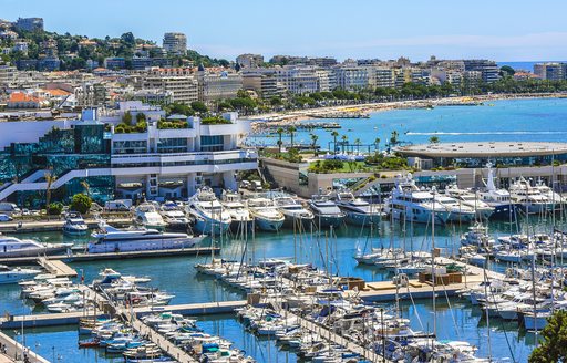 Overview of Vieux Port in Cannes, with many boat charters berthed