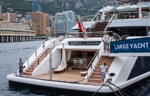 Crew on the deck of superyacht DAR in Port Hercule