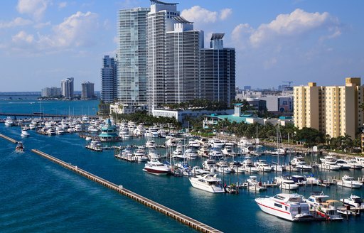 A marina in Miami full of motor yachts and sailing boats