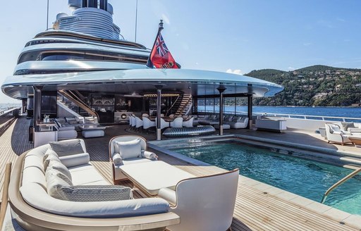 swimming pool surrounded by seating on board motor yacht JUBILEE