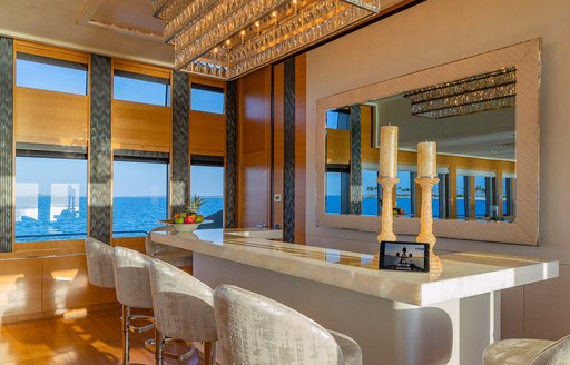 Wet bar and stools onboard charter yacht DB9