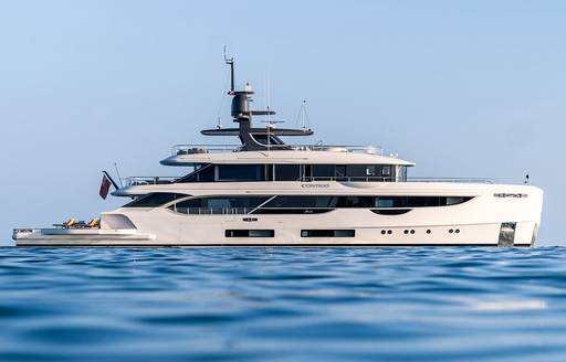 Charter yacht CONTIGO at anchor, surrounded by sea