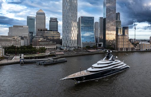 Charter yacht KISMET cruising by Canary Wharf in London