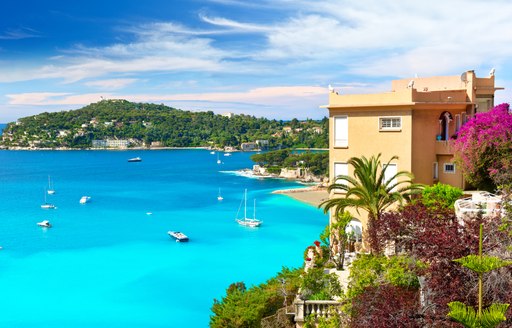 French Riviera coastline with blue sea and small yachts